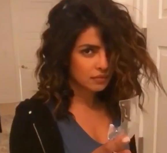Frustrated-Priyanka-Chopra-breaks-a-glass-of-wine-on-her-head