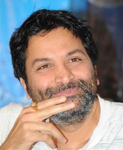 Who forced Trivikram Srinivas to come out from the hotel room?