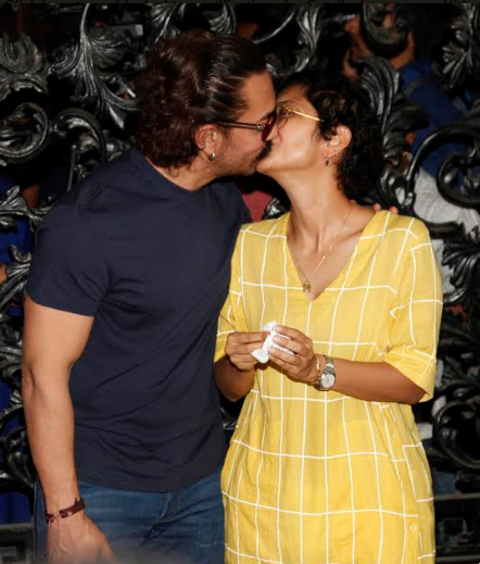 Aamir Khan and Kiran Rao share a passionate Kiss at Mumbai Airport