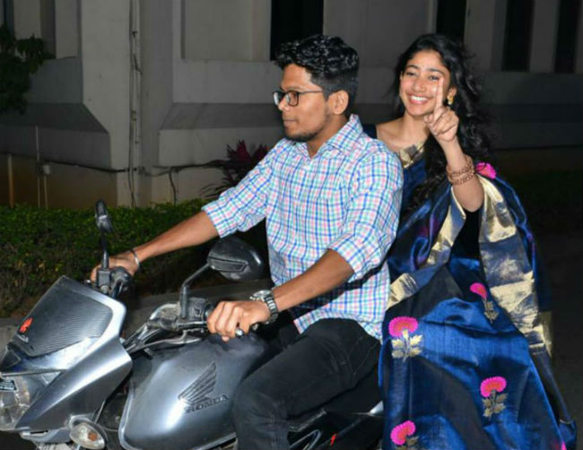 Sai Pallavi arrives on Bike for Kanam pre-release event due to traffic