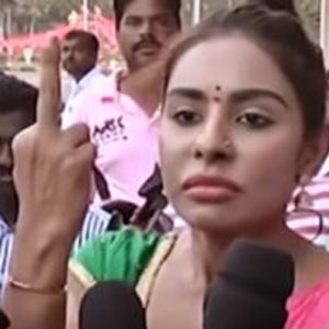 Sri Reddy abuse Pawan Kalyan using filthy language shows middle finger to Power Star Fans