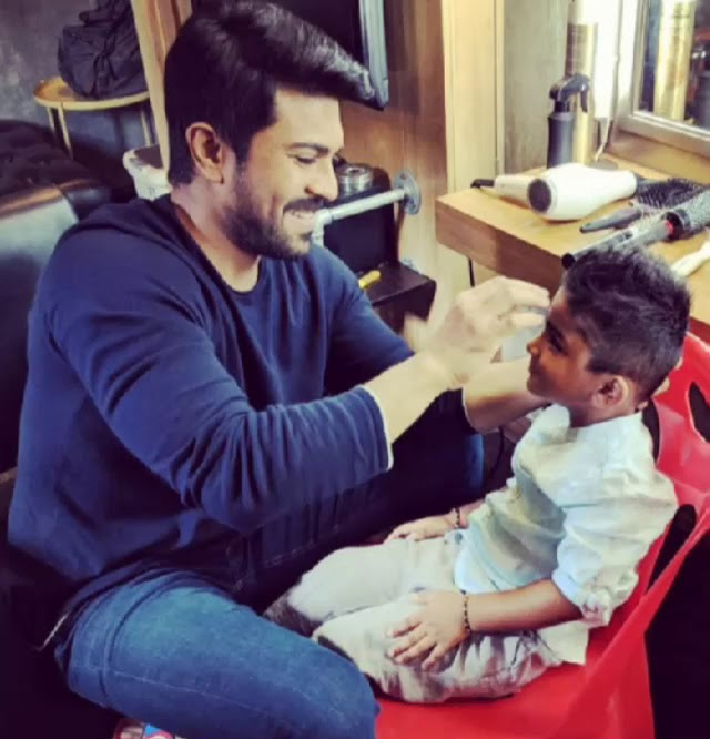 Ram Charan playing with Sneha Son