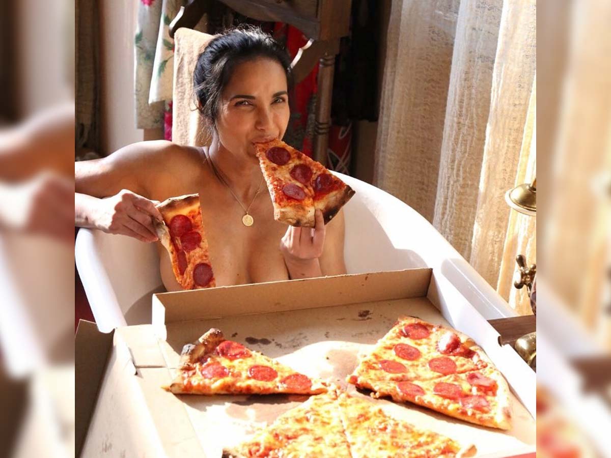 Topless Padma Lakshmi pizza party in bath tub