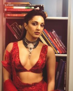 Lady Kabir flaunts major cleavage in bridal outfit