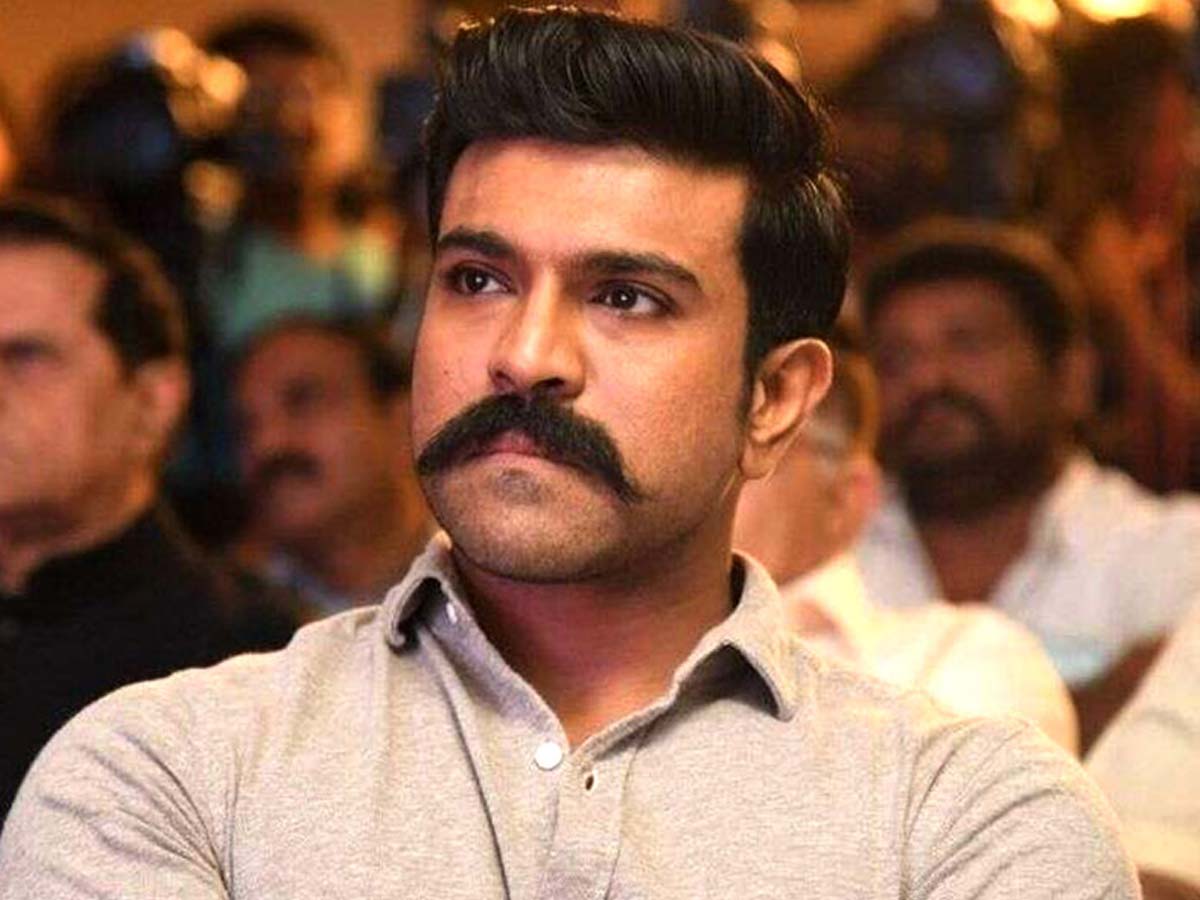 Ram Charan handed over the cheques