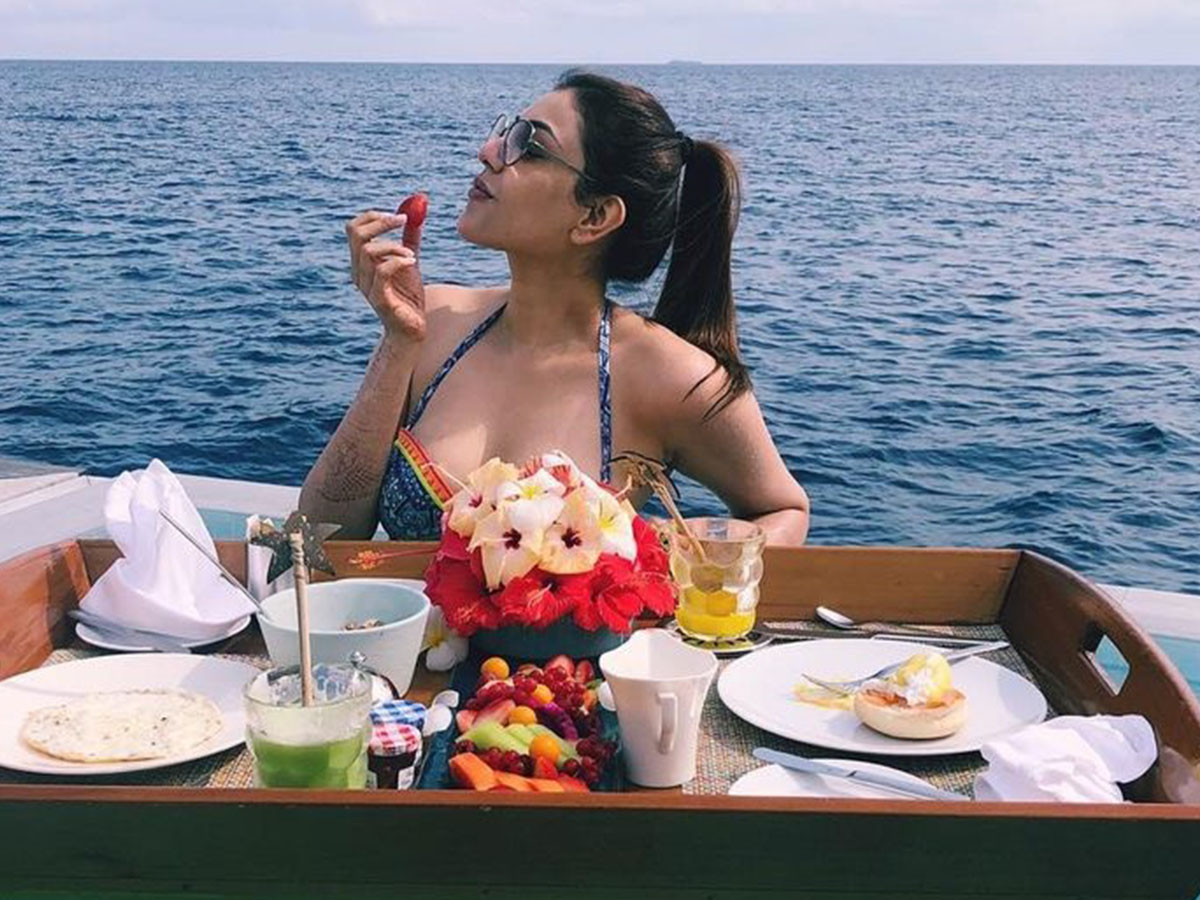 Bikini clad Kajal Aggarwal enjoys floating breakfast