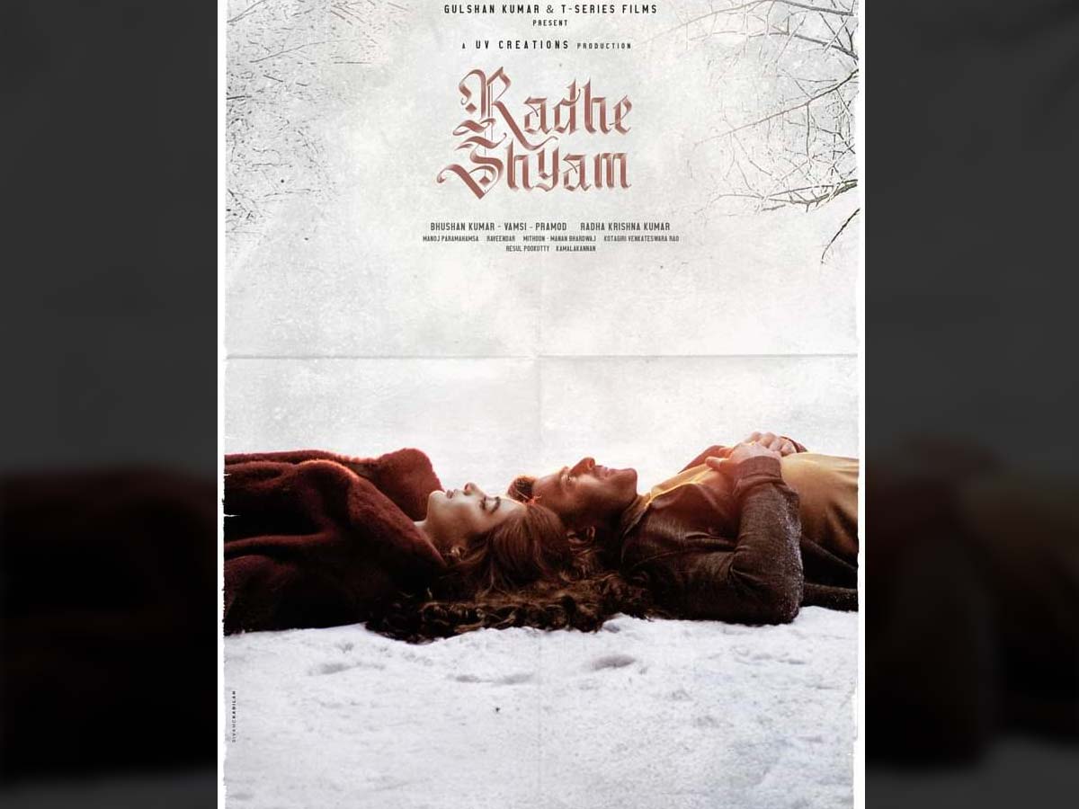 Radhe Shyam New poster Romantic Prabhas and Pooja Hegde lying on snow