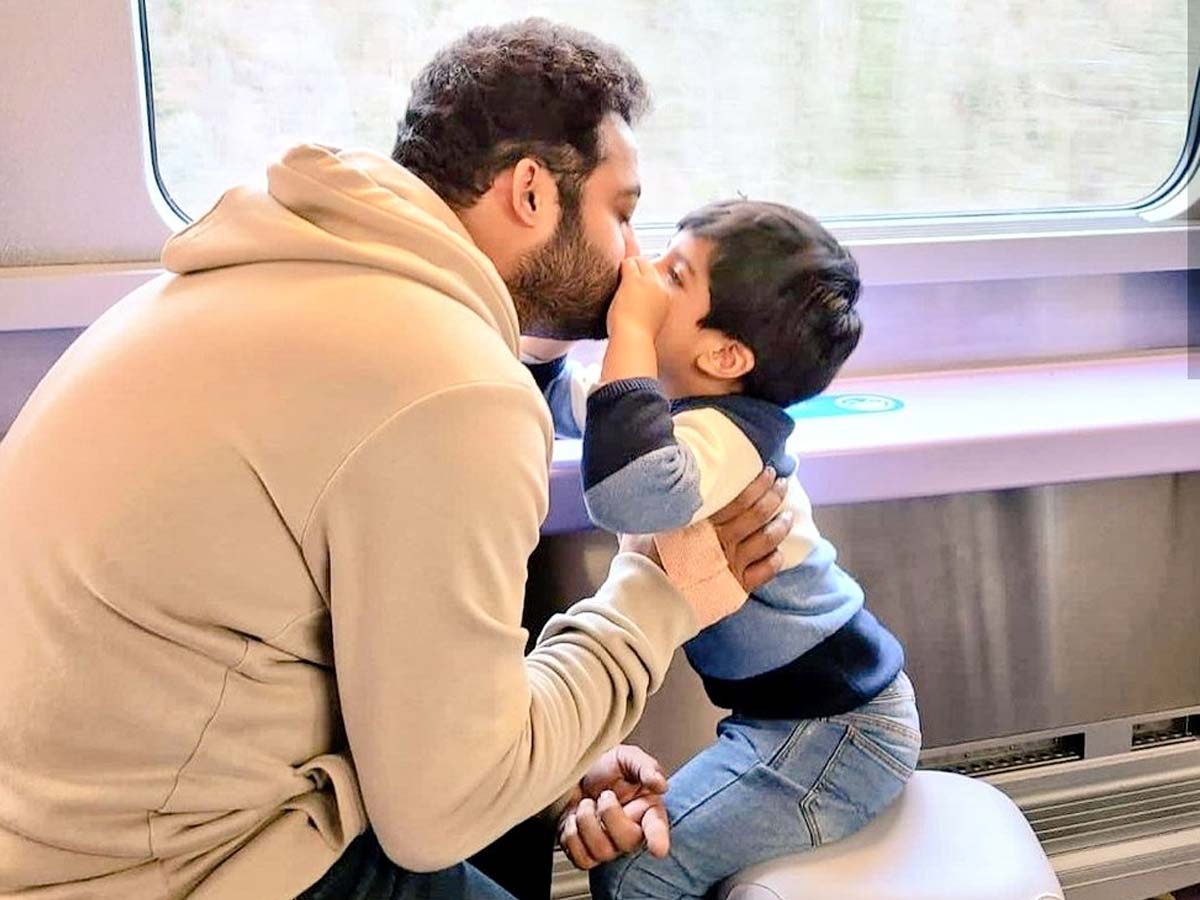 Lip to lip kiss between Young Tiger Jr NTR and little tiger Bhargav Ram in train