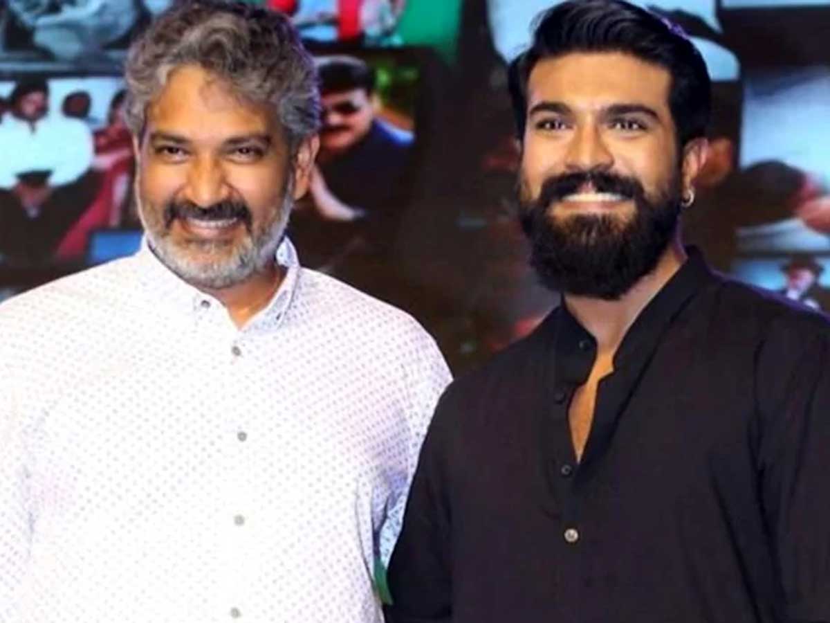 Rajamouli pushes Ram Charan in middle of 2000 people