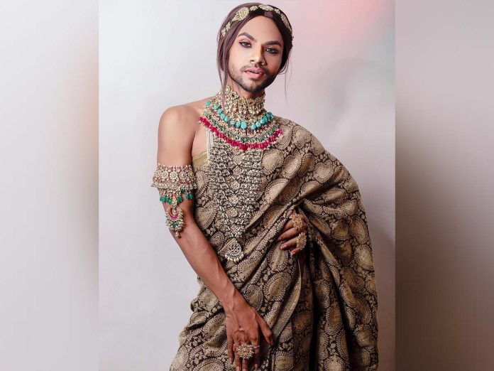 The first Bengali bisexual poser who wears a saree and shirt with equal passion