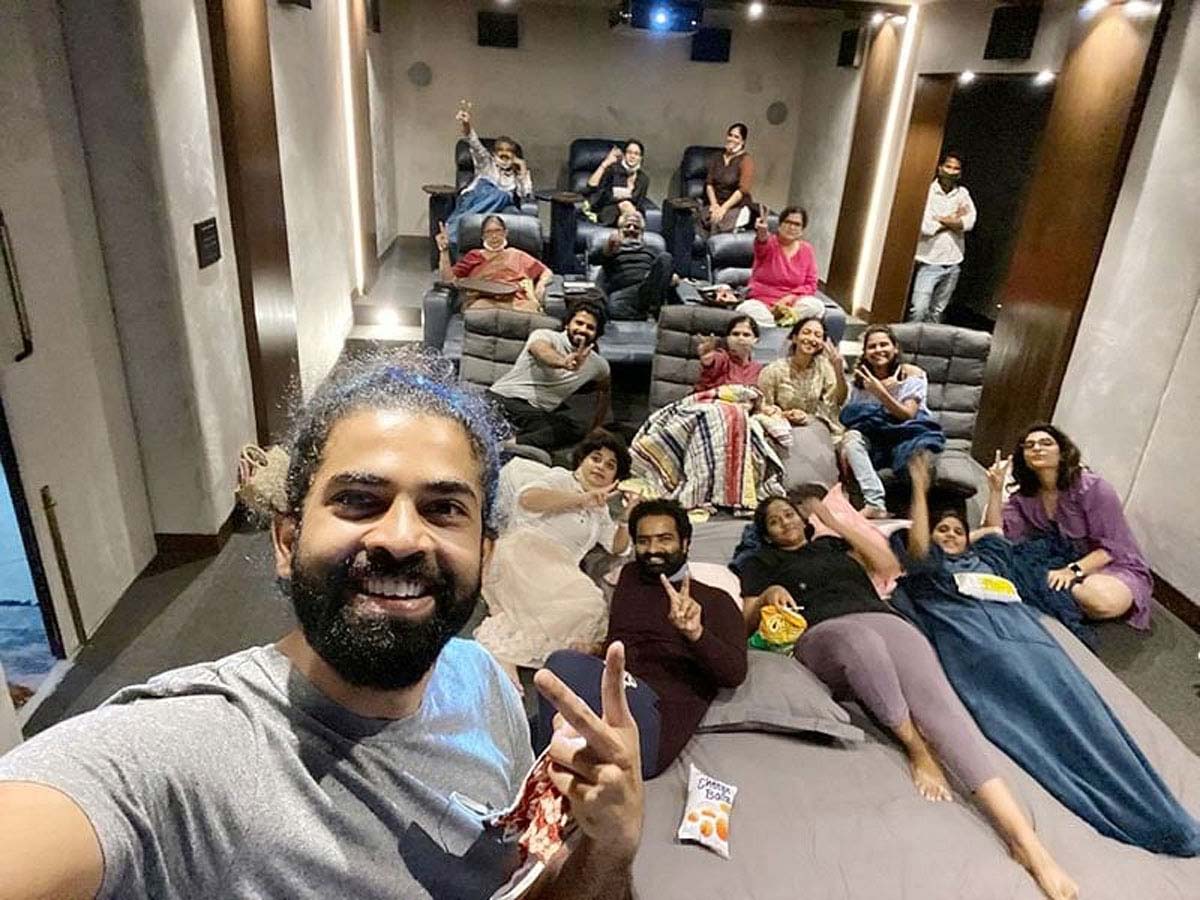 Rajamouli with wife and others watching Radhe Shyam