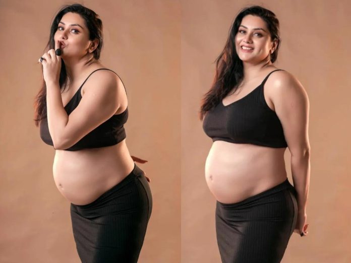 Billa lady Namitha is pregnant, flaunts baby bump