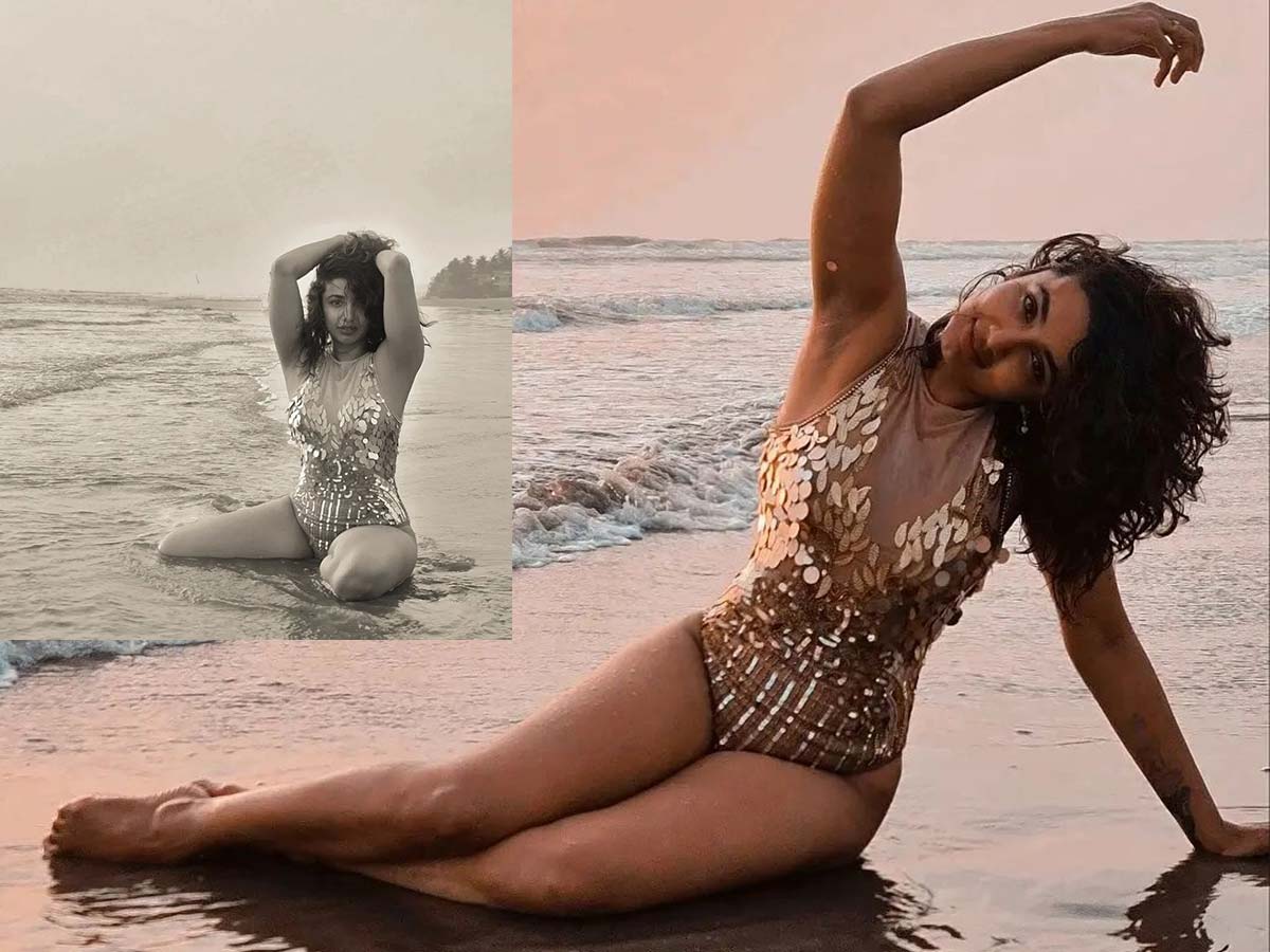 Pic Talk:  She provides enough eye candy with her pose on beach