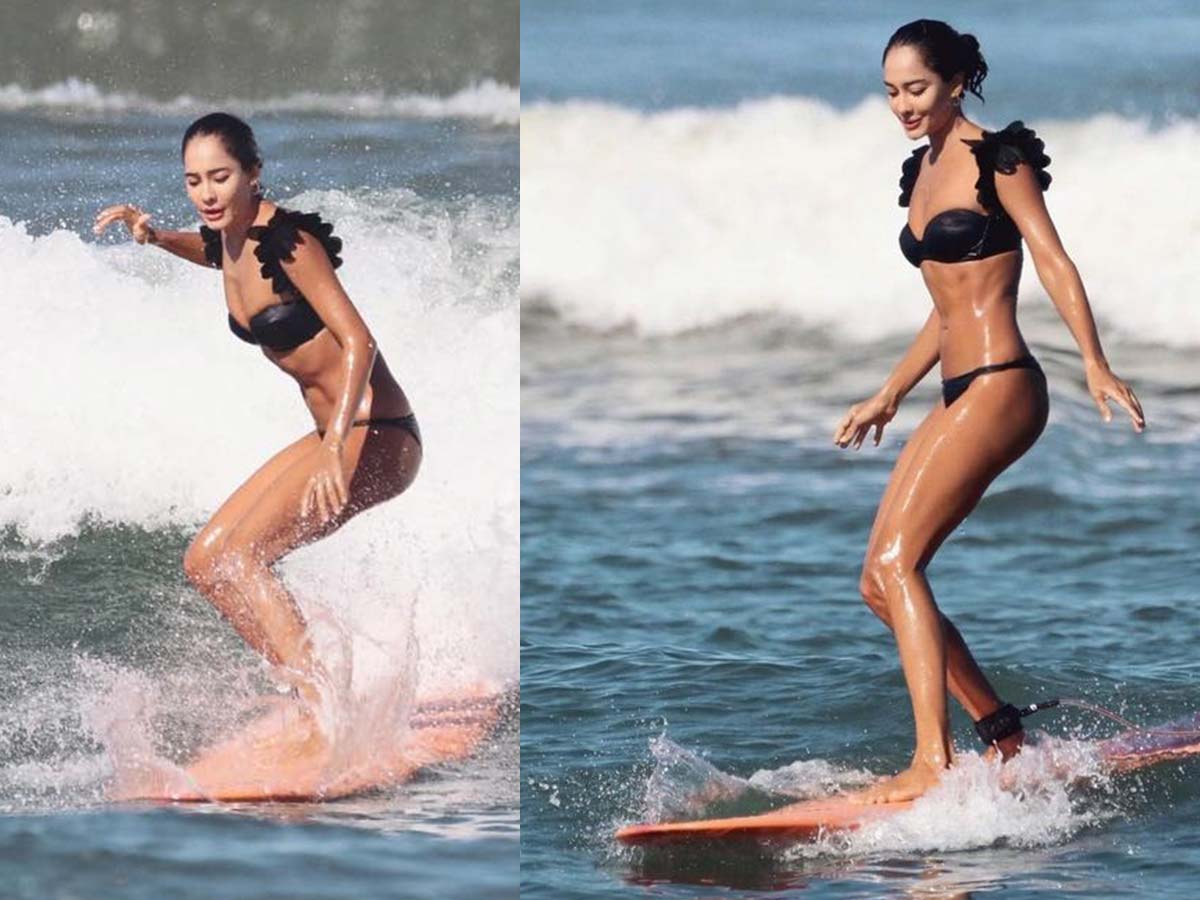 Pic Talk:  Bikini lady on the surfboard