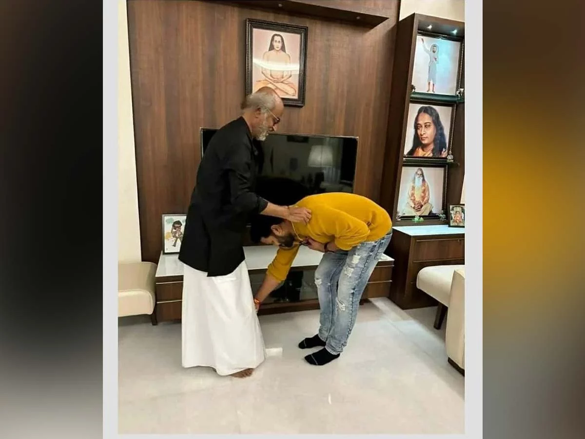 Rishab Shetty touches Rajinikanth feet