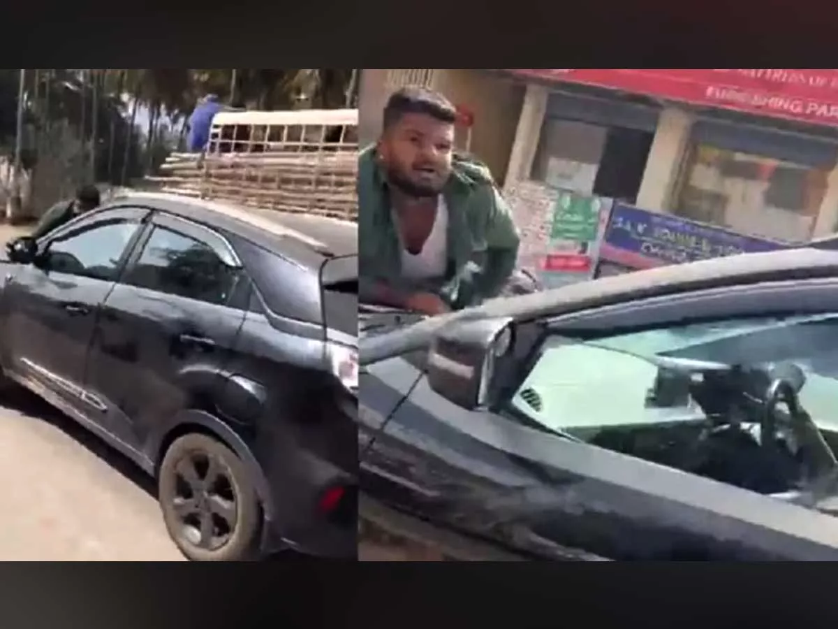 Caught on cam: Woman drags businessman on car bonnet for 3 km