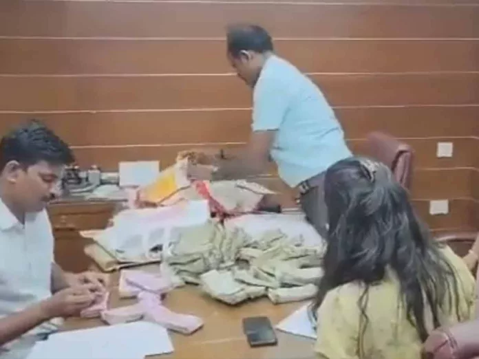 BJP MLA son caught red-handed taking Rs 40 Lakh Bribe, Cash on the table- video viral