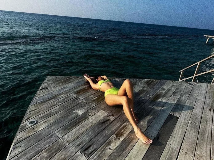 Pic Talk: Tara Sutaria resting in neon green bikini