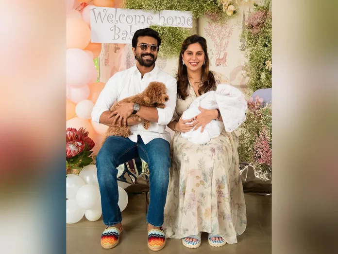 First Family pic: Ram Charan holds pet dog Upasana holds baby