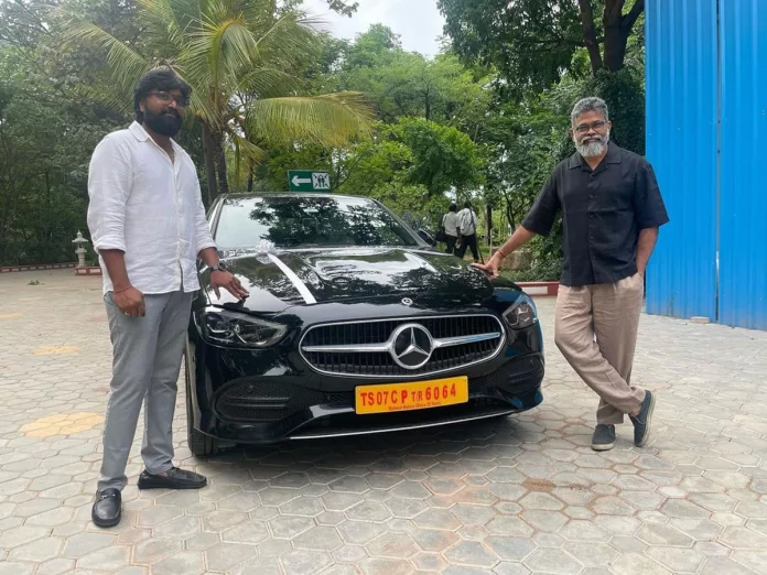 Virupaksha makers gifted an expensive Benz-C Class car to Karthik Varma Dandu