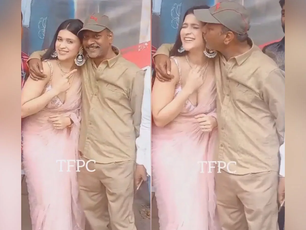 Filmmaker AS Ravi Kumar kisses Mannara Chopra in front of media