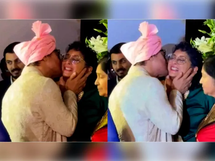 Aamir Khan kisses his ex-wife Kiran Rao at Ira Khan wedding